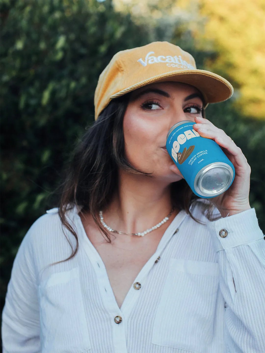 Nocaff - Person Drinking Can