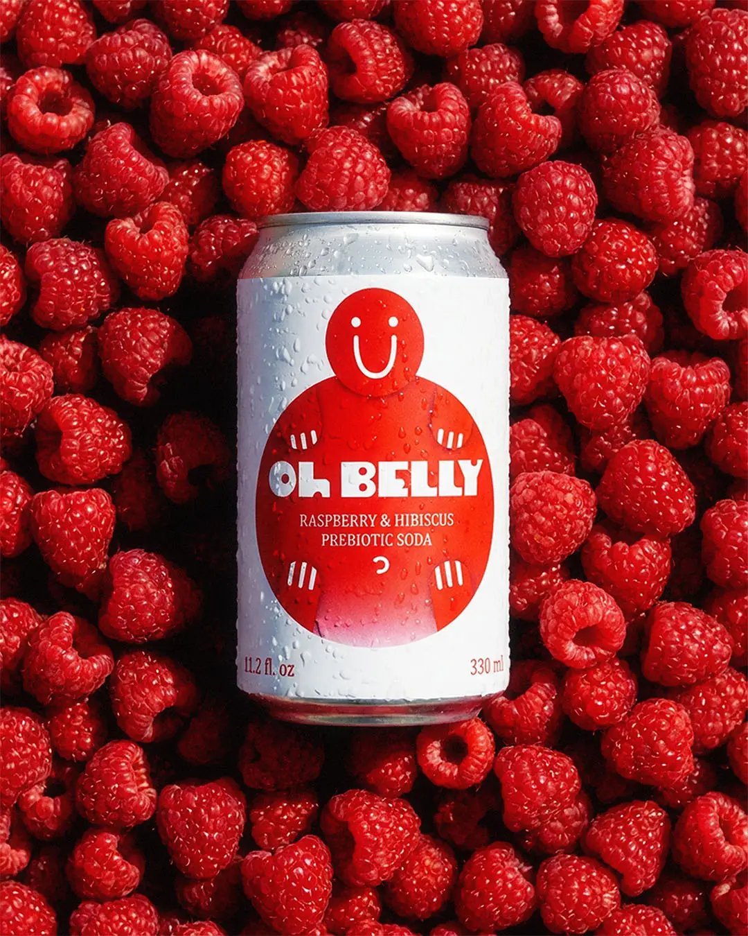 Oh Belly raspberry & Hibiscus Can on Top of Raspberries