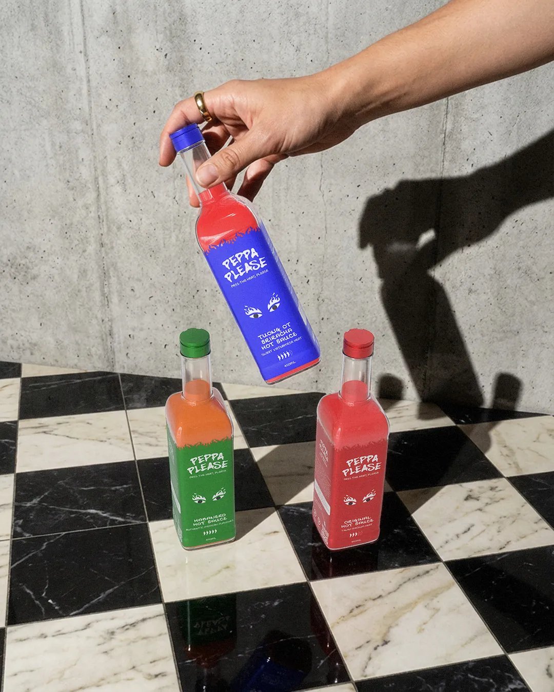 Peppa Please Bottles on Checkered Floor