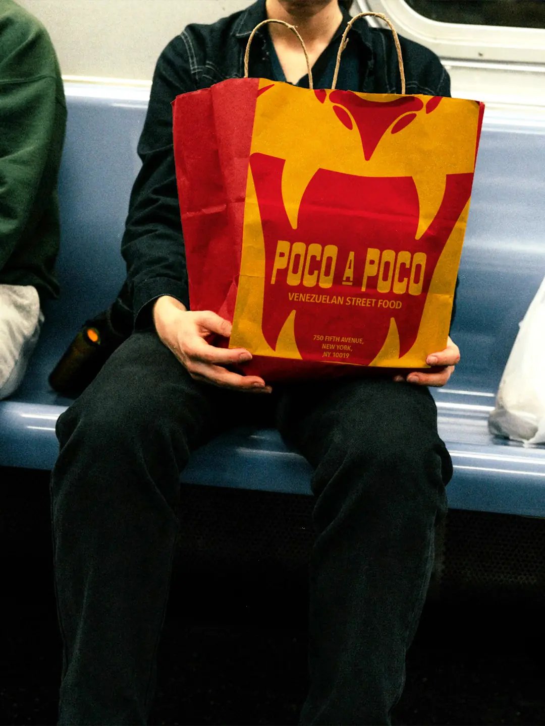 Poco A Poco takeaway bag on subway