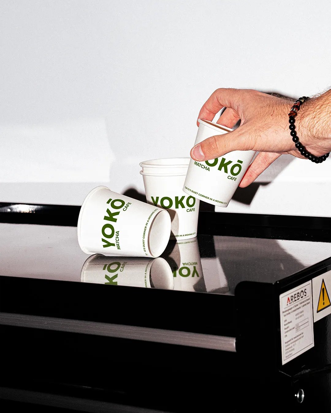 YOKŌ Cans On Top Of Coffee Machine