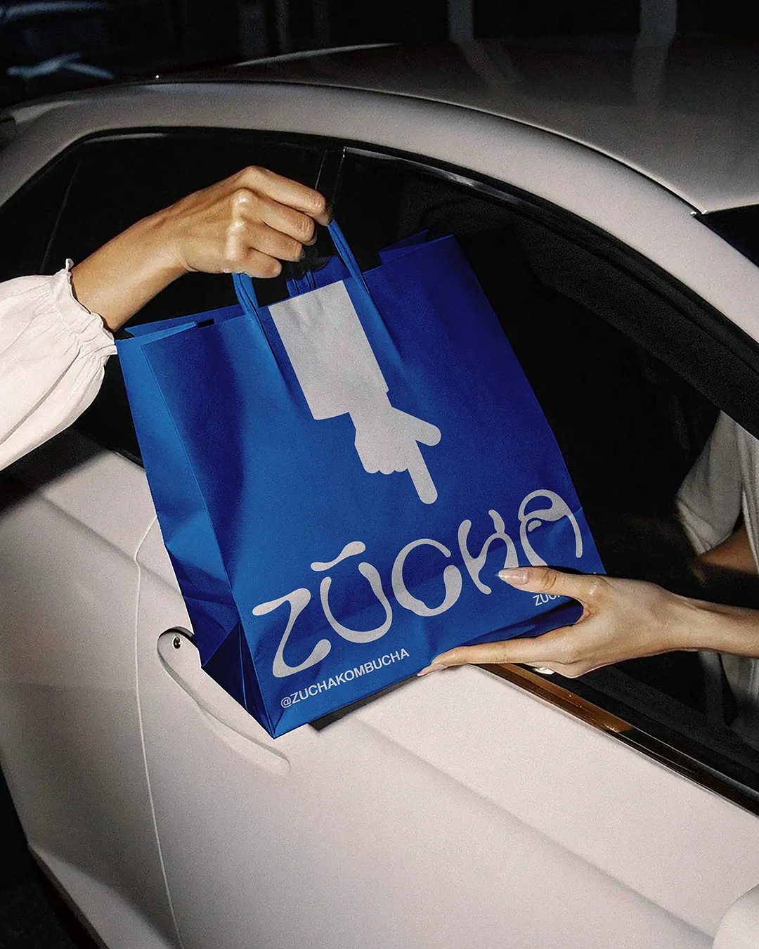 ZŪCHA Takeaway Bag Passed Into Car